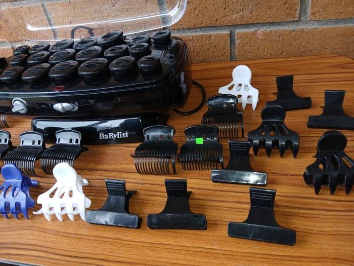 New BaByliss heated hair roller kit including rollers and clips.