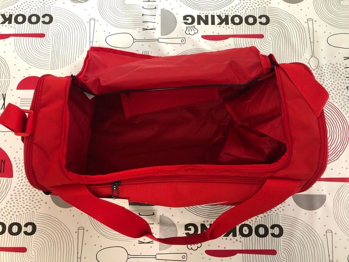 This is a Brand New Nike bag - Red & Black