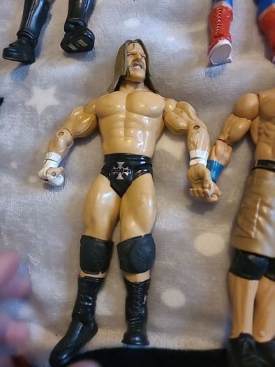 13 WWE wrestling figures