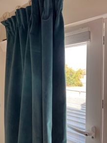 Pair of velvet custom made fully lined teal curtains