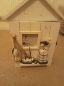 house to hang keys door has a place to put small photo
