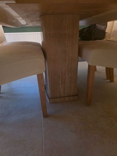 Marble table with 4 cream leather chairs