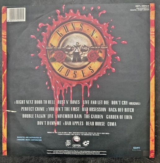 Guns n Roses very rare Zimbabwe Pressing. Use your illusion 1  Vinyl, vg+ .The sleeve is VG+.  Small splits to mid front opening. Small tear to back