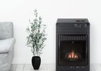 Flame Gas Heater with Fireplace Effect  Cosy, Safe & Portable