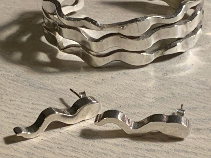 Silver bracelet and earrings