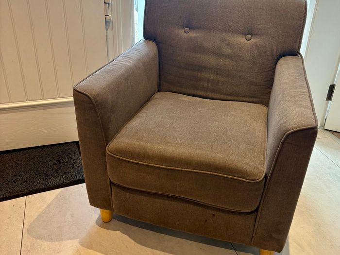 Grey fabric armchair