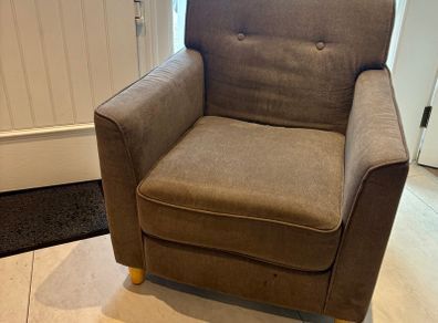 Grey fabric armchair
