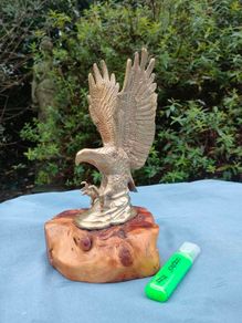 Vintage cast brass eagle on bog oak