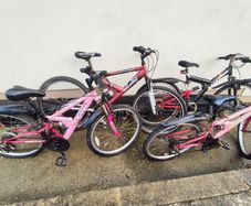 Four-bike bundle - two 24-inch Apollo and two 26-inch adult bikes