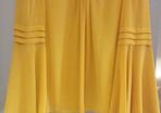 Brand new. Mustard chiffon top