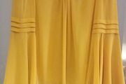 Brand new. Mustard chiffon top