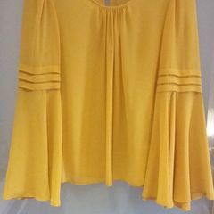 Brand new. Mustard chiffon top