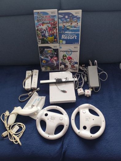 Wii with Mario kart, Sports resort, Mario Galaxy, Smash Brawl and HDMI