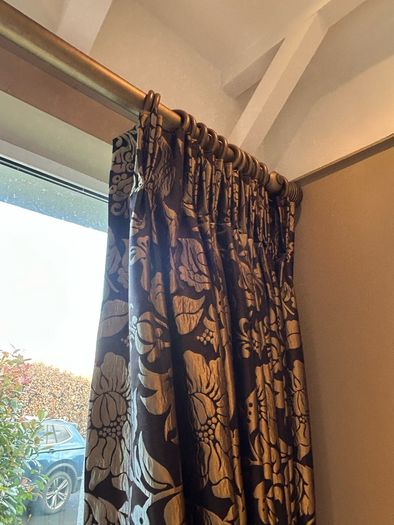Pair of large lined black and gold curtains