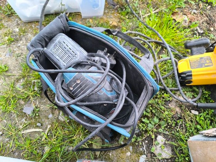 Various power tools sold as a set