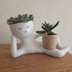 Funny planter with plant