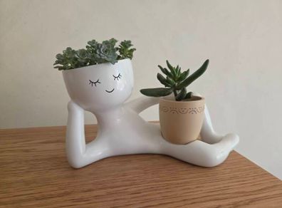 Funny planter with plant
