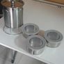.Stainless steel kitchen fridge storage containers with biscuits container, like new. Keeps food fresh for long. Image 2