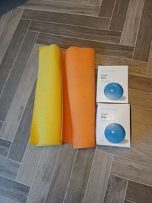 Two New Boxed Gym Balls and Two Used Yoga Mats