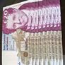 10 consecutive 20 pound banknotes Image 5