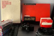 3 Pentax Auto 110 film cameras and accessories boxed