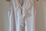 White sleeveless top