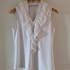 White sleeveless top