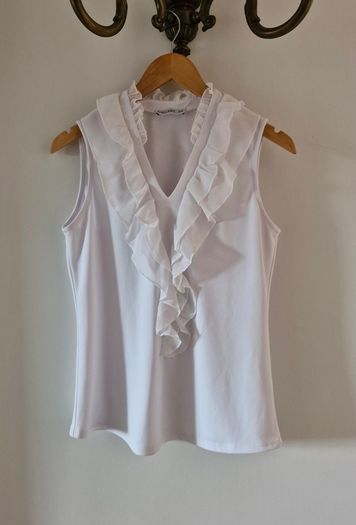 White sleeveless top