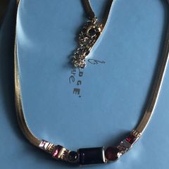 gold colored necklace
