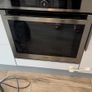 kitchen appliances: induction hob, incorporated oven, dishwasher and microwave Image 3