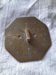 old miniature sundial