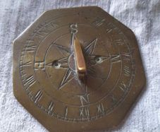 old miniature sundial