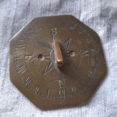 old miniature sundial