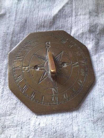 old miniature sundial