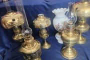 Six vintage oil lamps . Polished