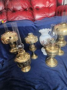 Six vintage oil lamps . Polished