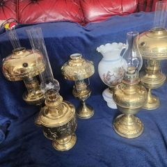 Six vintage oil lamps . Polished
