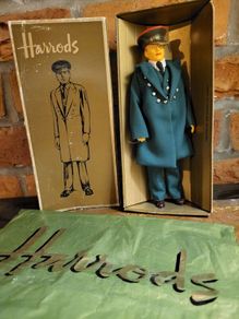 A vintage Harrods Figure
