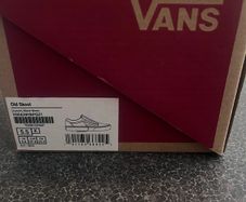 Brand new black Vans in the box