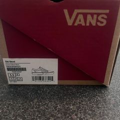 Brand new black Vans in the box