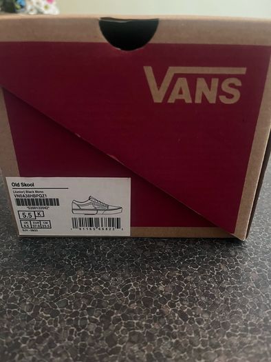 Brand new black Vans in the box
