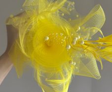 title fascinator hat in yellow
