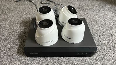 Hikvision 8-Channel DVR with 4 Cameras (Working Condition)