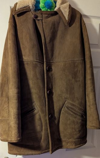 Vintage mans Sheepskin coat size Medium.