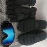 Woman ski boots gloves and glasses Image 2