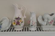 4 floral decorated vases