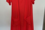 Cos summer dress, short sleeves, swing design, patch pockets at front. Amazing colour