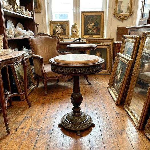Old marble topped brass decorated table