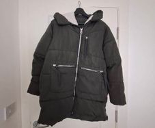 Dark green puff jacket