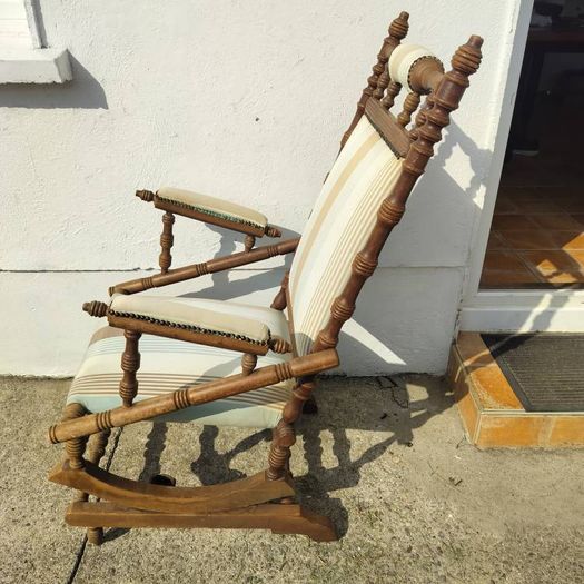 Swinging antique armchair